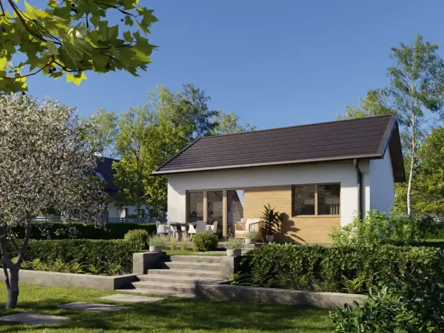 Nowoczesny dom szkieletowy z drewnianymi elementami, otoczony zielenią.