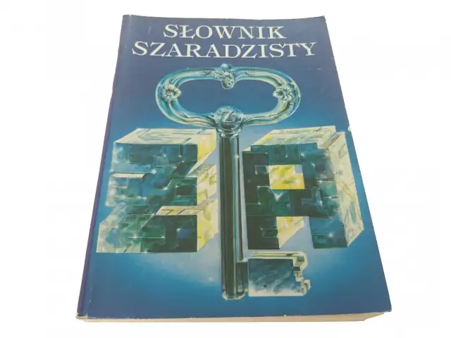 Słownik szaradzisty: klucz do efektywnego szukania trudnych i nietypowych haseł. Okładka z kluczem i kostkami.