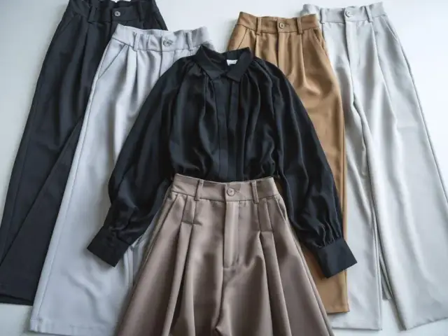 Jakie spodnie do czarnej bluzki? Poradnik na każdą okazję!