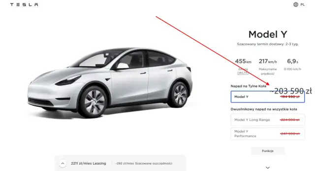 Biały Tesla Model Y z ceną 203 590 zł.