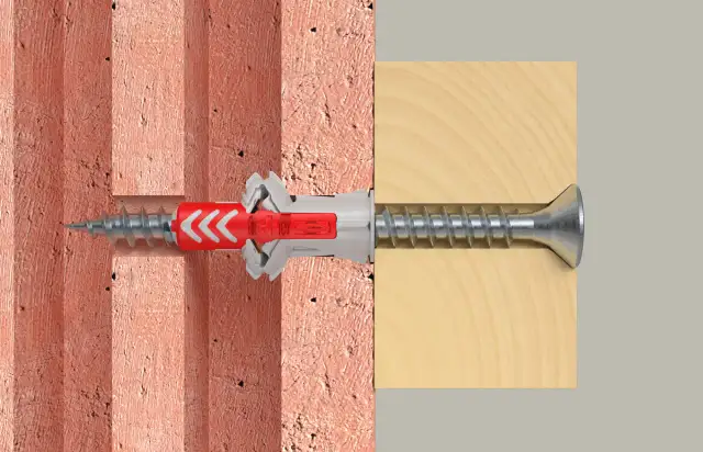 Cegła dziurawka: Jak bezpiecznie mocować? Wybierz kołek i technikę!