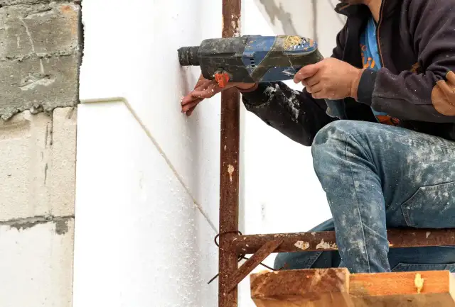 Ile kosztuje ocieplenie domu z tynkiem - pełna kalkulacja i porady