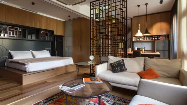 Jak wydzielić pokój w salonie: skuteczne i estetyczne metody podziału przestrzeni