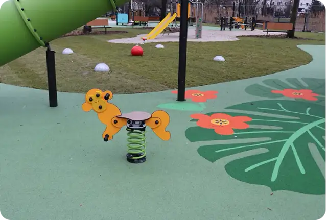 Bezpieczne podłoże pod plac zabaw w ogrodzie - uniknij niebezpieczeństw