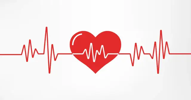 Czerwone serce z linią EKG na białym tle.