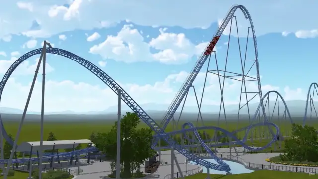 Kolejka górska Hyperion Energylandia z wagonikami wjeżdżającymi na wysoki tor.