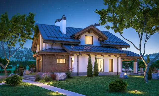 Piękny dom z drewna i białego tynku, oświetlony lampami ogrodowymi, pokazuje, jak oświetlić pomieszczenie bez prądu.