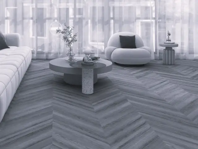 Nowe panele winylowe w jodełkę tworzą stylową bazę dla nowoczesnego salonu.