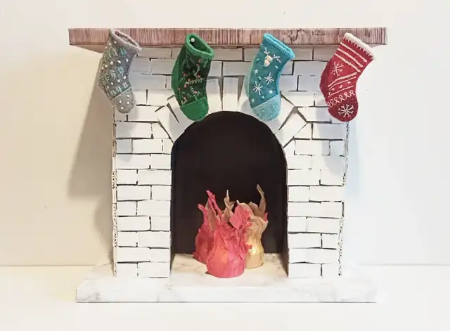 Jak zrobić kominek z kartonu? Tani i efektowny hit DIY!