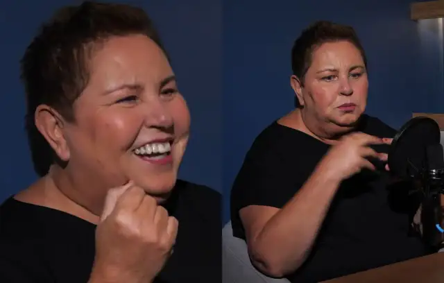 Dorota Wellman waga: uśmiechnięta i skupiona podczas rozmowy przy mikrofonie.