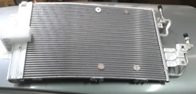 Jak wymienić chłodnicę klimatyzacji Astra H - uniknij kosztownych błędów