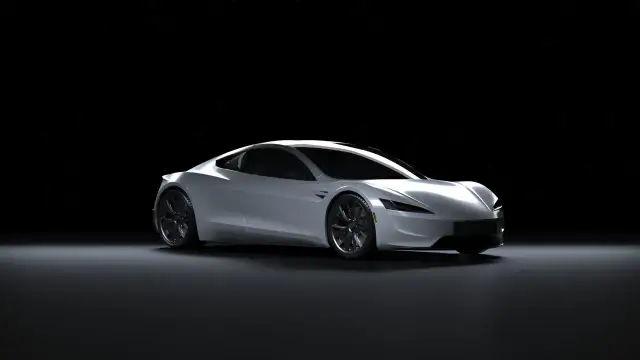 Srebrny Tesla Roadster na czarnym tle. Zastanawiasz się, ile kosztuje Tesla?