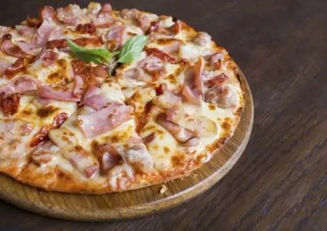 Recette pizza maison facile: le secret d'une pâte et cuisson réussies