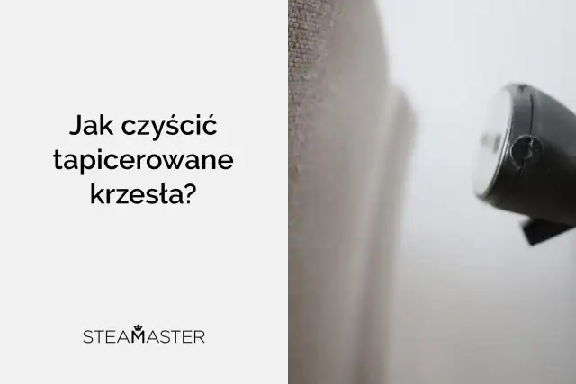 Zbliżenie na parownicę czyszczącą tapicerowane krzesło.