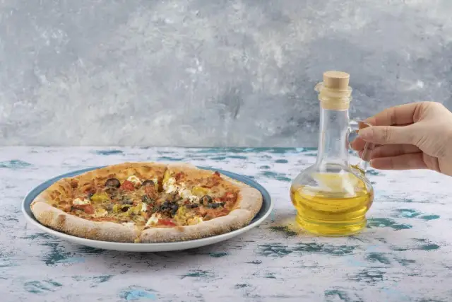 Jaka oliwa do pizzy? Odkryj najlepsze wybory dla smaku pizzy
