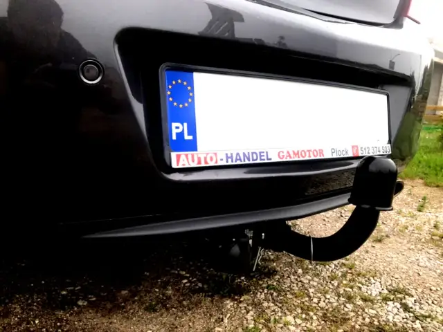 Opel Insignia: Podłącz hak holowniczy krok po kroku (instrukcja)