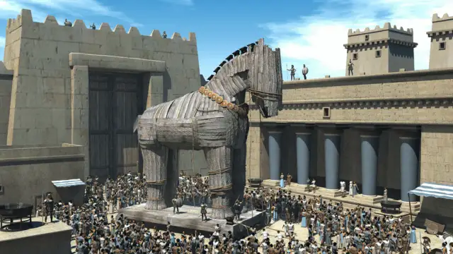 Wielki drewniany koń, symbol mitu o koniu trojańskim, stoi przed bramą miasta. Tłum ludzi obserwuje go z podziwem.