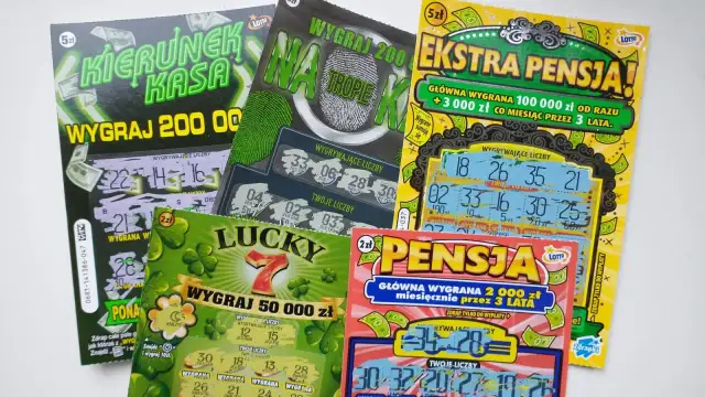 Kilka zdrapek Lotto z różnymi motywami i kwotami wygranych.