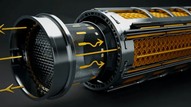 Schemat filtra DPF z przepływem spalin i widocznym wkładem filtrującym.