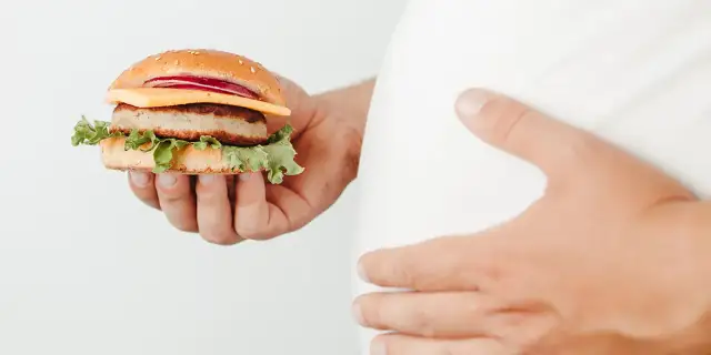 Czy obżarstwo to grzech ciężki? Poznaj ważne zasady i konsekwencje