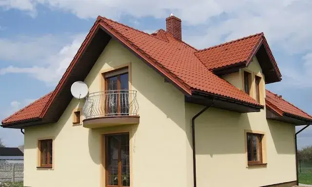 Jakie okna do ceglastego dachu? Oto kolory, które musisz znać