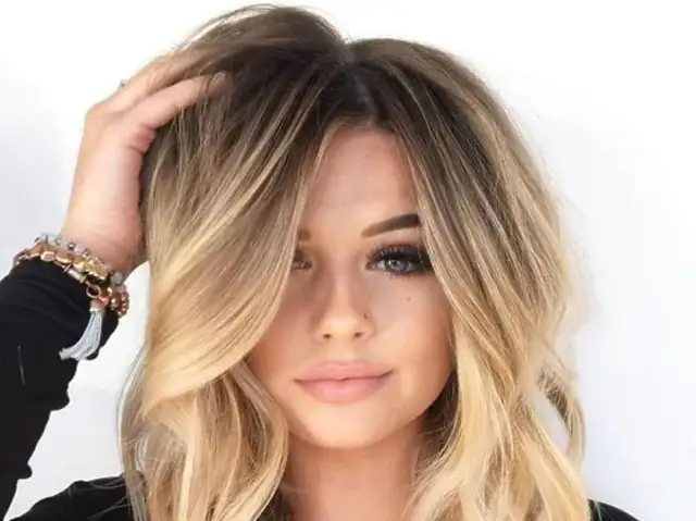 Jakie fryzury do okrągłej twarzy optycznie wysmuklą Twoją twarz