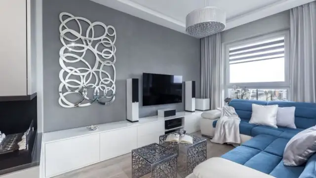 Jakie meble wybrać do salonu z szarymi ścianami? Inspiracje i porady