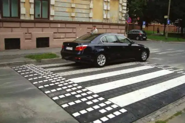 Progi zwalniające w jakiej odległości od budynku – uniknij problemów