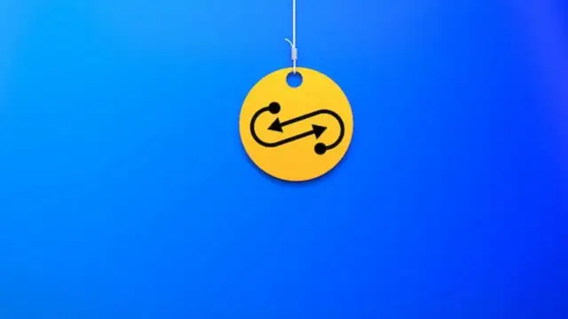 Żółty krążek z symbolem nieskończoności i strzałkami, wiszący na nitce. Czy to symbolizuje swap?