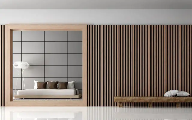 Nowoczesna sypialnia z łóżkiem, lampą i drewnianymi lamelami.