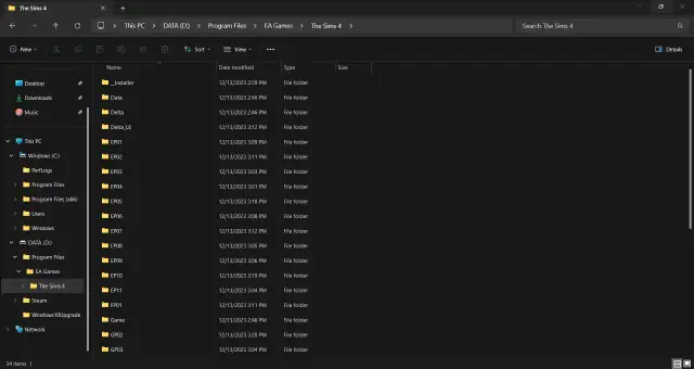 Widok folderów gry The Sims 4 w Eksploratorze plików Windows.