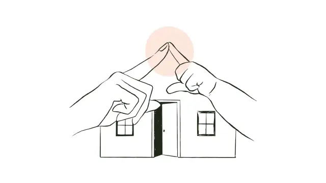 Dwie dłonie tworzą dach nad domkiem z otwartymi drzwiami i oknem.