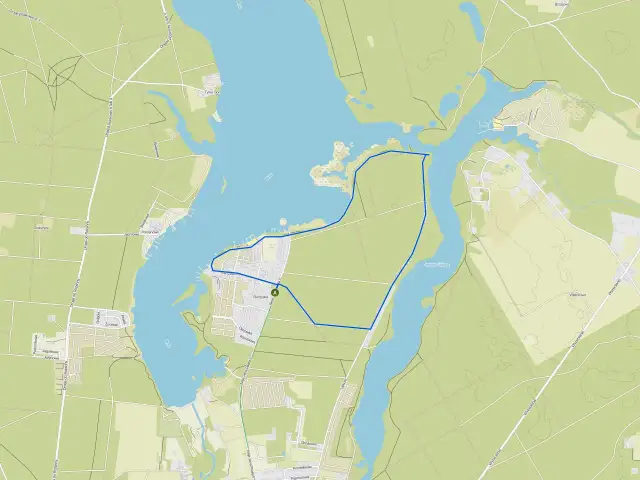 Mapa turystyczna z zaznaczoną trasą wokół **zalewu Koronowskiego**. Widoczne drogi, zabudowania i linie brzegowe.