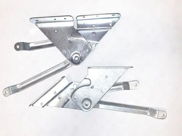 Metalowe podnośniki do wersalki, gotowe do montażu. Zobacz, jak zamontować podnośnik do wersalki, by cieszyć się funkcjonalnością mebla.