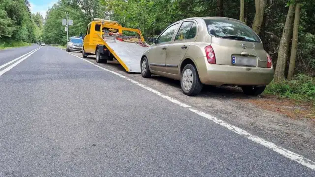 Jak oznaczyć holowany samochód, aby uniknąć problemów na drodze?