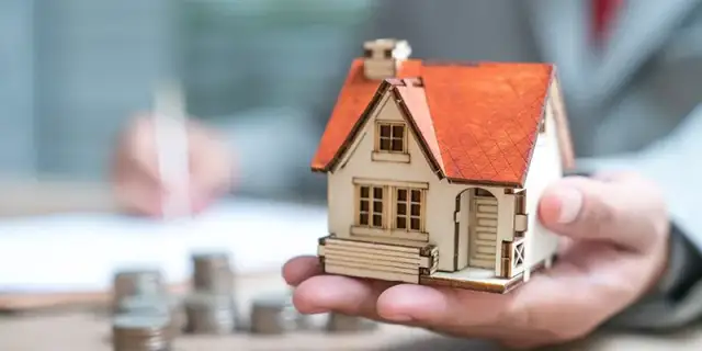 Kto płaci podatek od nieruchomości przy współwłasności? Poznaj zasady