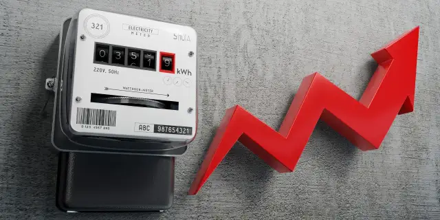 Licznik energii elektrycznej i czerwona strzałka w górę symbolizują wzrost cen prądu.