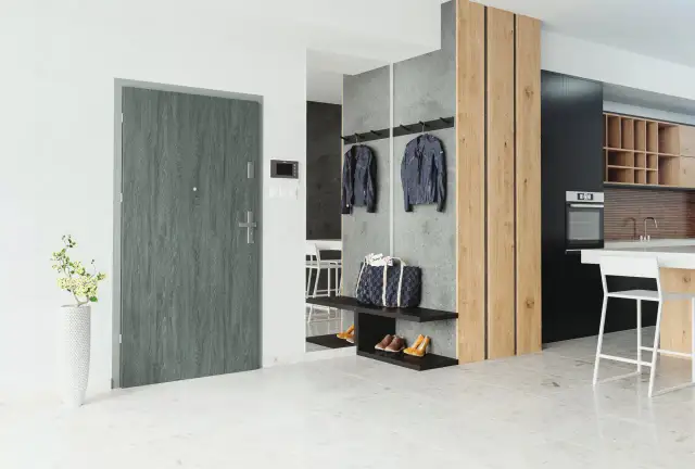 Jakie drzwi do mieszkania w bloku wybrać, aby uniknąć hałasu?