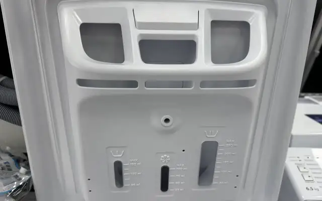 Gdzie wlać płyn do prania w pralce od góry, aby uniknąć błędów?