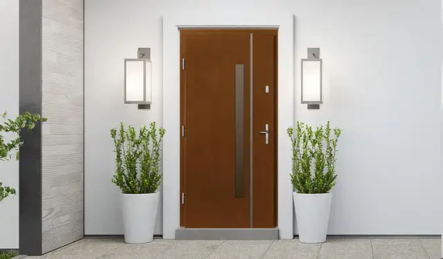 Drzwi metalowe czy drewniane do domu - co wybrać dla bezpieczeństwa i stylu?
