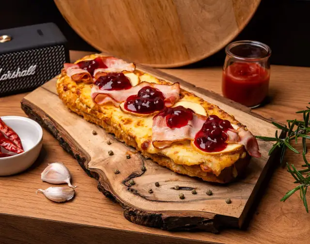 Najlepsze przepisy na zapiekankę góralską, które zachwycą każdego