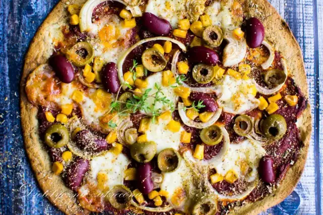 Pizza Capriciosa: 800-1200 kcal? Jak jeść ją fit i bez wyrzutów!