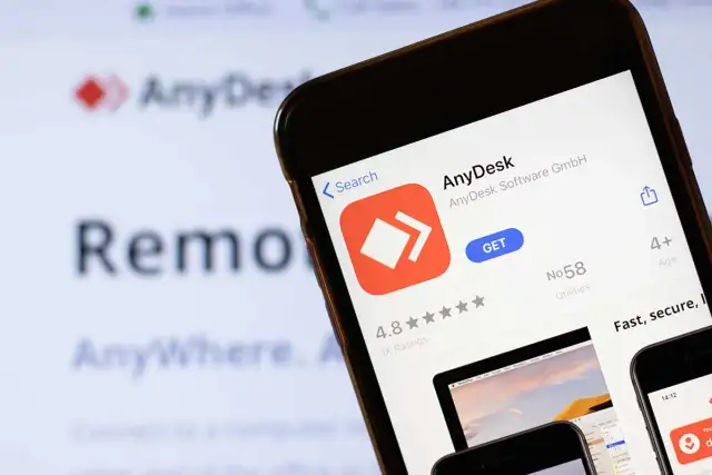 Aplikacja AnyDesk na telefonie, pokazująca jej sklep z aplikacjami. Dowiedz się, anydesk co to jest i jak działa zdalny pulpit.