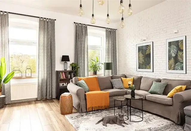 Jak ocieplić salon dodatkami? Praktyczne porady na przytulne wnętrze