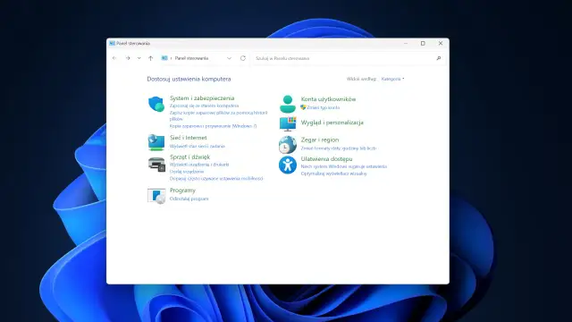 Panel sterowania z kategoriami: System i zabezpieczenia, Sieć i Internet, Sprzęt i dźwięk, Programy, Konta użytkowników, Wygląd i personalizacja, Zegar i region, Ułatwienia dostępu.