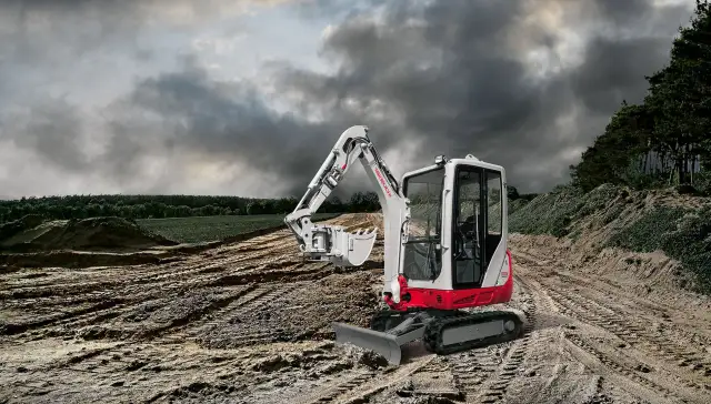 Mini koparka Takeuchi TB216 na budowie, gotowa do pracy. Sprawdź Takeuchi TB216 dane techniczne.