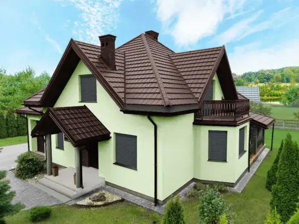 Brązowa dachówka - jakie kolory elewacji stworzą harmonijny wygląd?