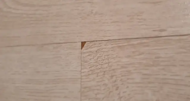 Jak skutecznie naprawić dziurę w panelu podłogowym? Zobacz metody!