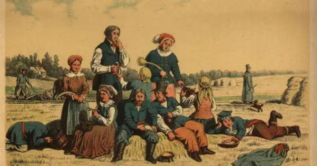 Grupa ludzi w strojach ludowych odpoczywa na polu. W tle widać domy i snopki siana. Obraz symbolizuje uwłaszczenie chłopów i wolność.
