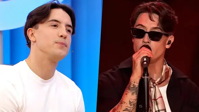 Dawid Kwiatkowski w białej koszulce i na scenie w okularach, z mikrofonem. Czy jego partnerka jest dumna?